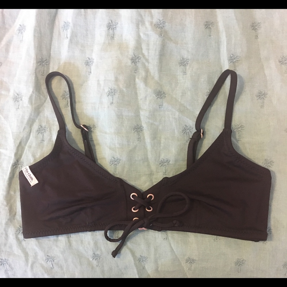Black lace-up bikini top by Rhythm Swimwear
